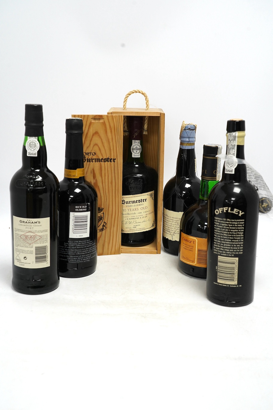 Six bottles of port, sherry etc. including Beresford Solera 1914, Grahams 1996, Harveys Rich Old Oloroso, Carlos I (6). Condition - fair to good